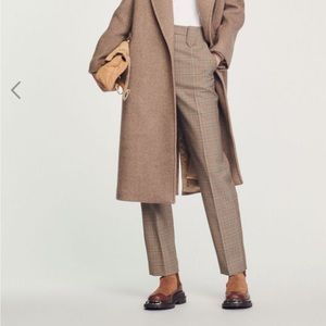 It’s a beautiful wool coat from Sandro.